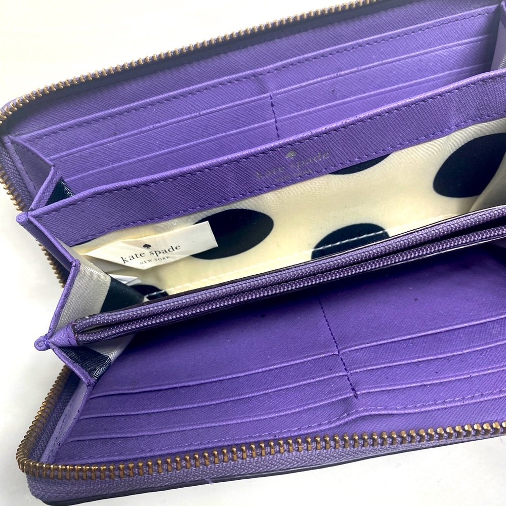 Kate Spade New York Continental purple wallet.